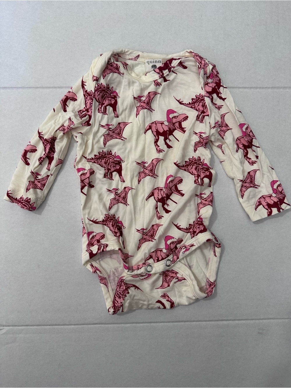 KATE QUINN long sleeve lap neck bodysuit in pink santa dinos 0-3 months